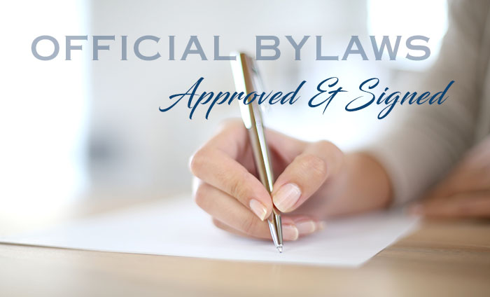 Closeup of woman’s hand writing on paper